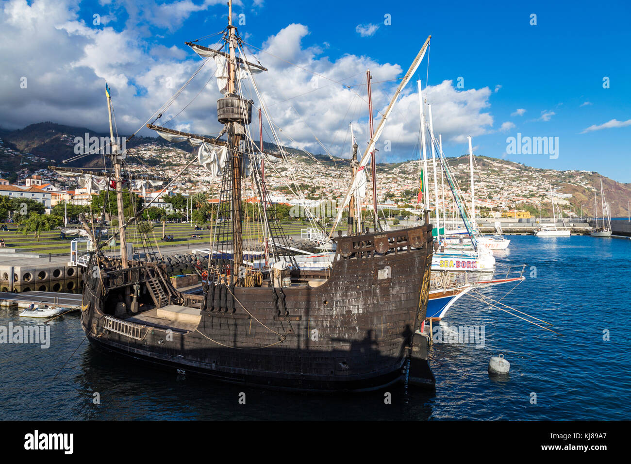 Replica of the Santa Maria sailing ship in the port at Funchal, Madeira, Portugal Stock Photo