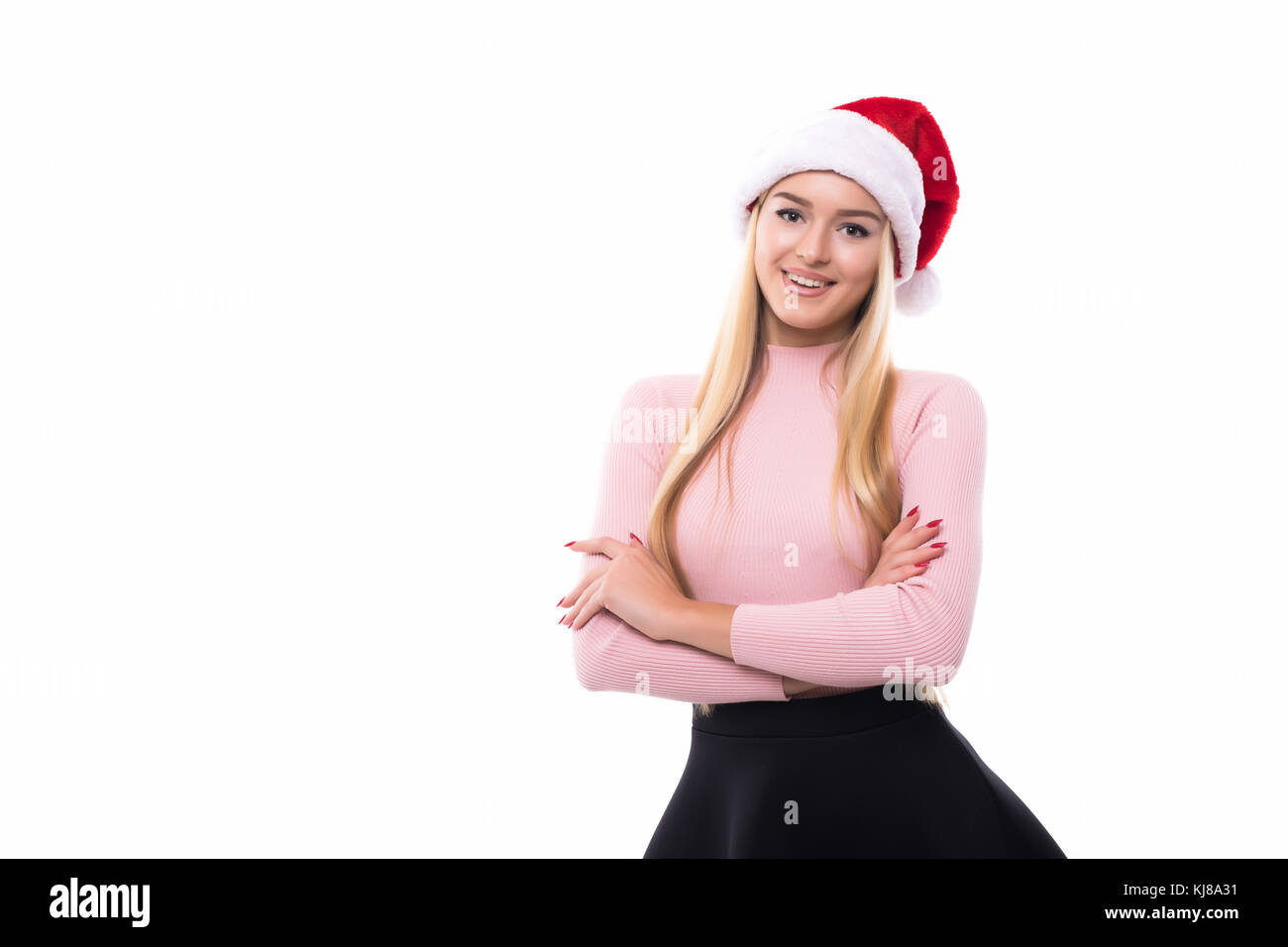 Portrait of joyful pretty woman in red santa claus hat laughing ...