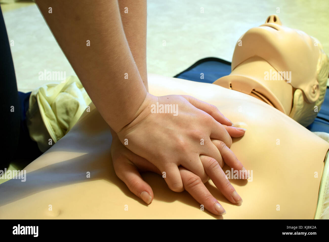 CPR training with CPR dummy. First aid resuscitation concept. Stock Photo