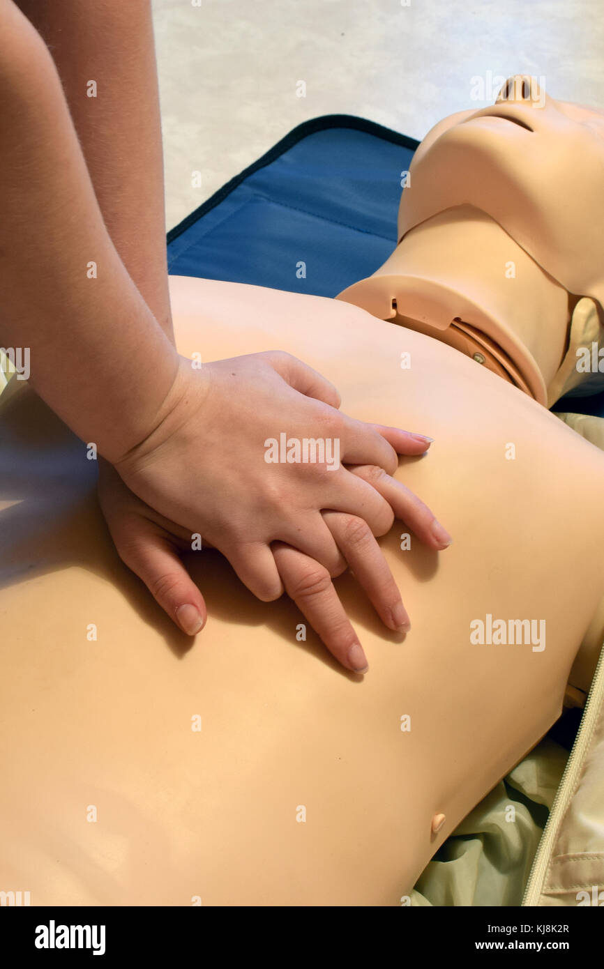 CPR training with CPR dummy. First aid resuscitation concept. Stock Photo