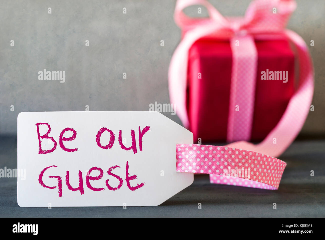 Pink Gift, Label, Text Be Our Guest Stock Photo