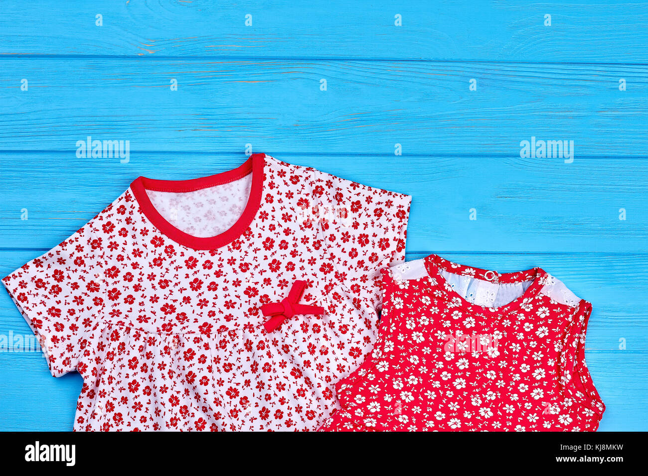 Close up of simple cotton baby dresses. Children clothes for casual ...
