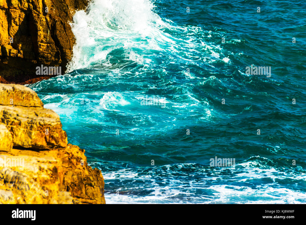 high cliff above the sea, summer sea background, many splashing waves