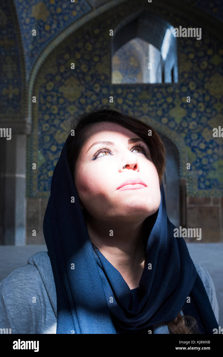 Muslim woman in mosque Stock Photo