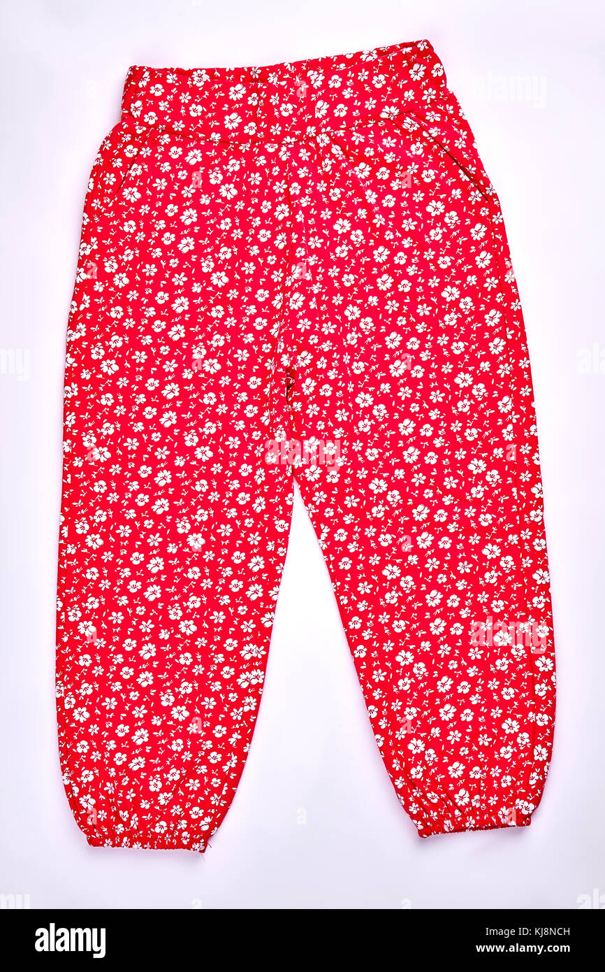 Babygirl patterned pants, front view. Toddler girl red harems with a