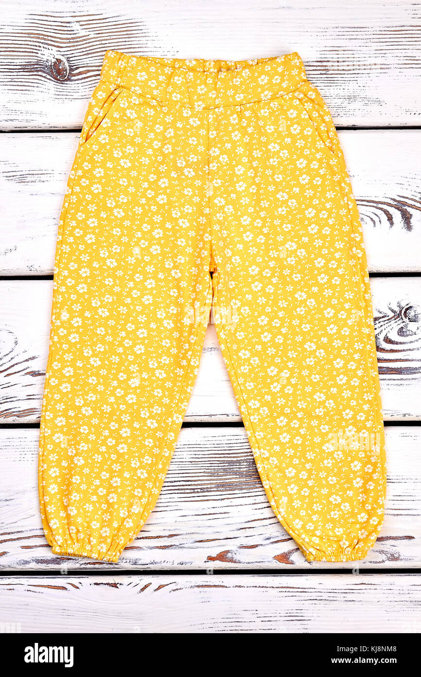 Baby girl yellow casual trousers. Toddler girl cotton patterned