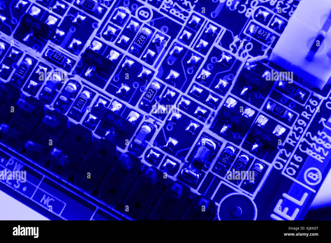 Blue Computer Components Electronics components on modern PC computer motherboard blue ...