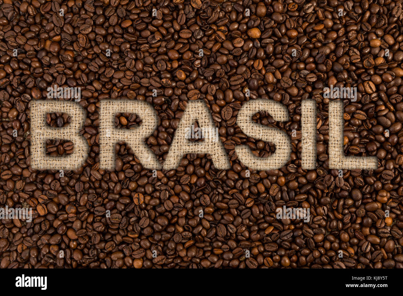 Brasil coffee concept text on roasted beans and jute fabric as high quality country origin Stock Photo
