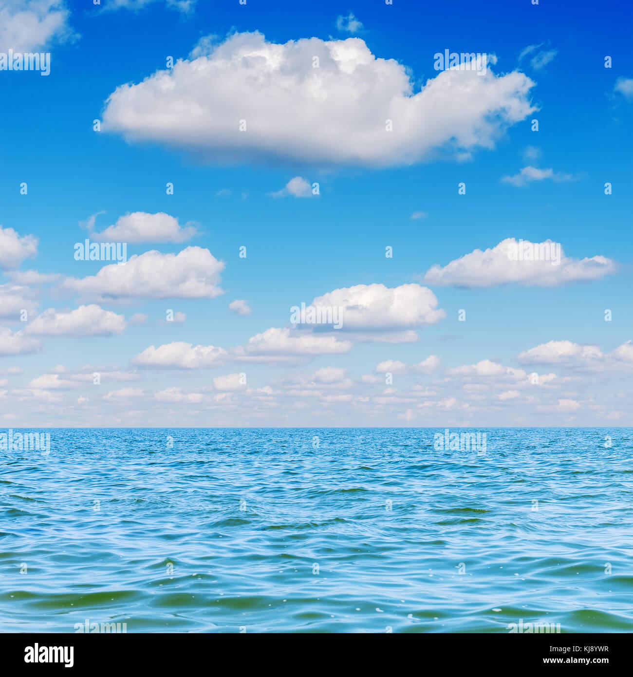 blue sea and clouds in sky over it Stock Photo - Alamy