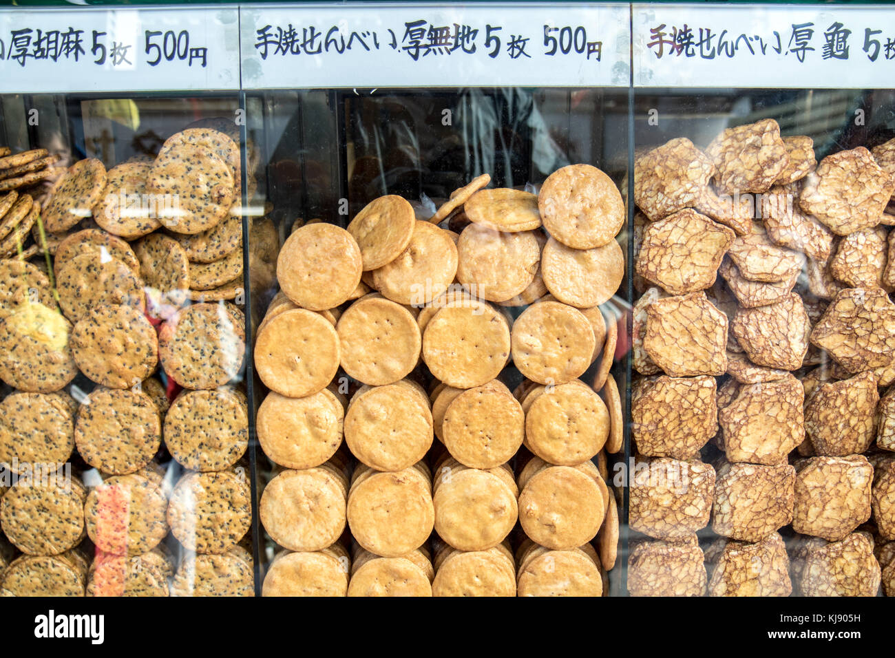JAPAN, TOKYO, NOV 18 2016, Senbei rice crackers at shop.  Nakamise Dori shopping street way to Asakusa Sensoji-ji Temple, Tokyo, Japan. Stock Photo