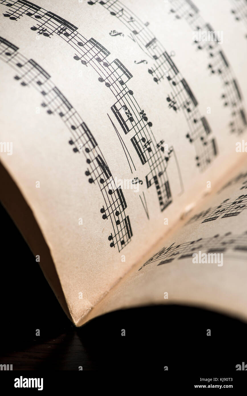Music notation book. Page with music notes. Vinatge pages Stock Photo
