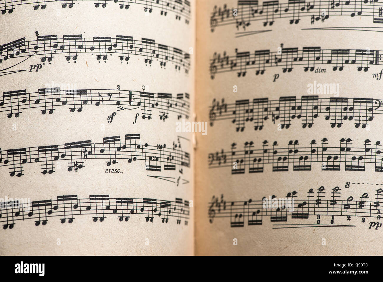 Music notation book. Page with music notes. Vinatge pages Stock Photo