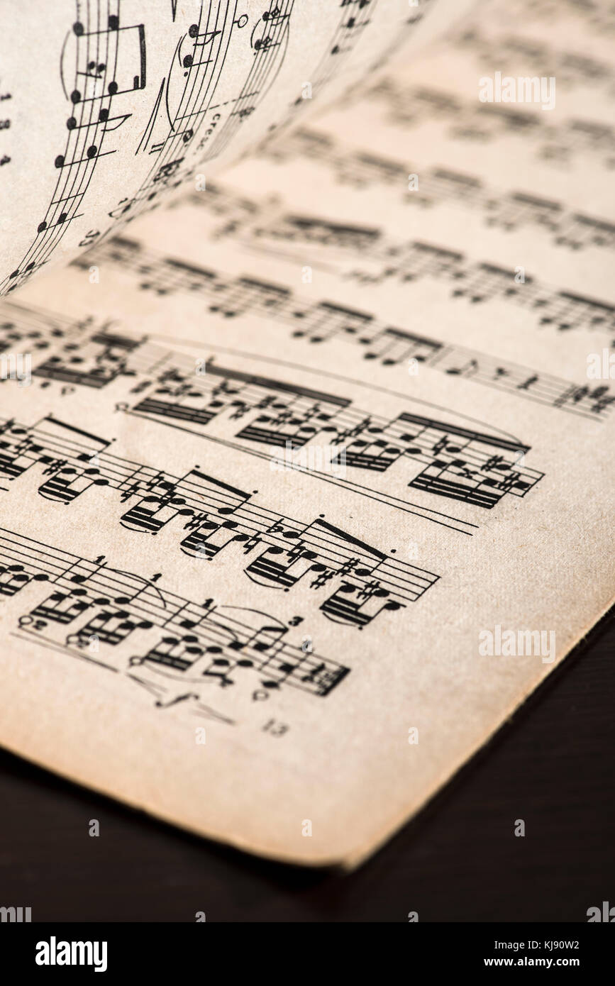 Music notation book. Page with music notes. Vinatge pages Stock Photo