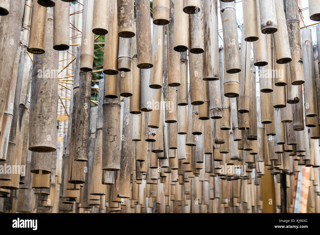 A Bamboo Sticks Hang From The Ceiling At Outdoor Constructions