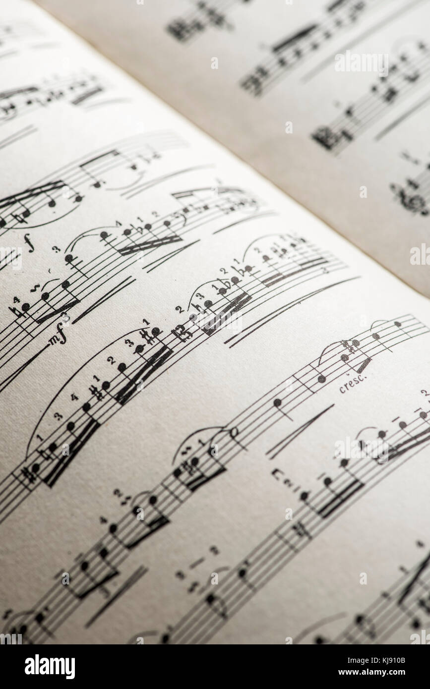 Music notation book. Page with music notes. Vinatge pages Stock Photo