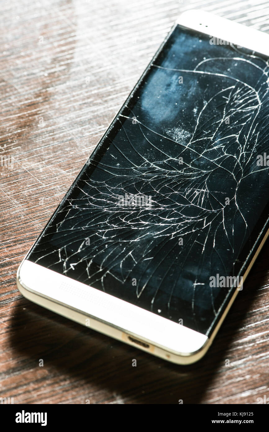 Cracked smart phone screen. Broken phone display. Window light Stock Photo  - Alamy