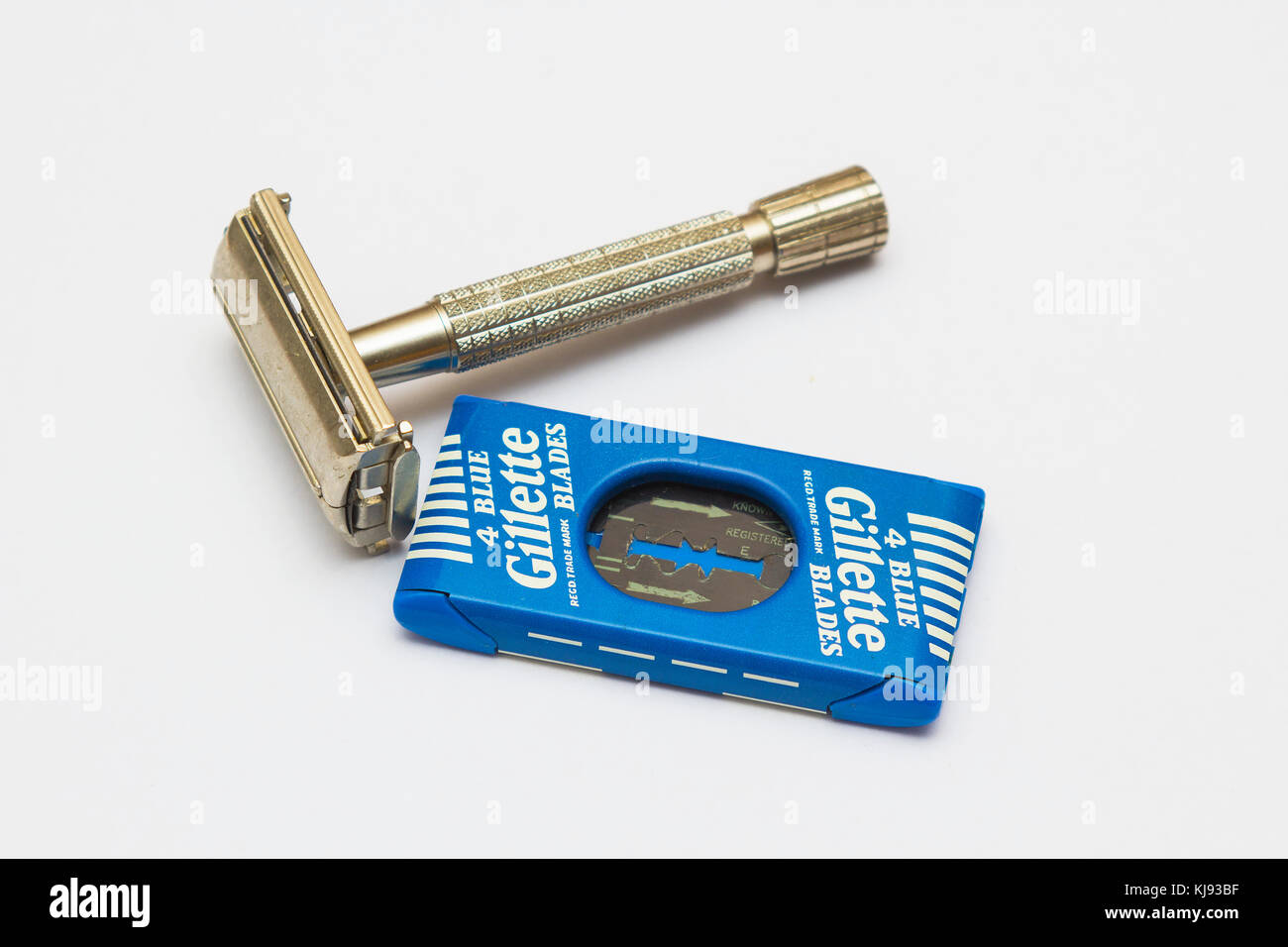 An old fashioned Gillette safety razor with double edged blue blades in their original dispenser owned by a collector in Bangor Northern Ireland Stock Photo