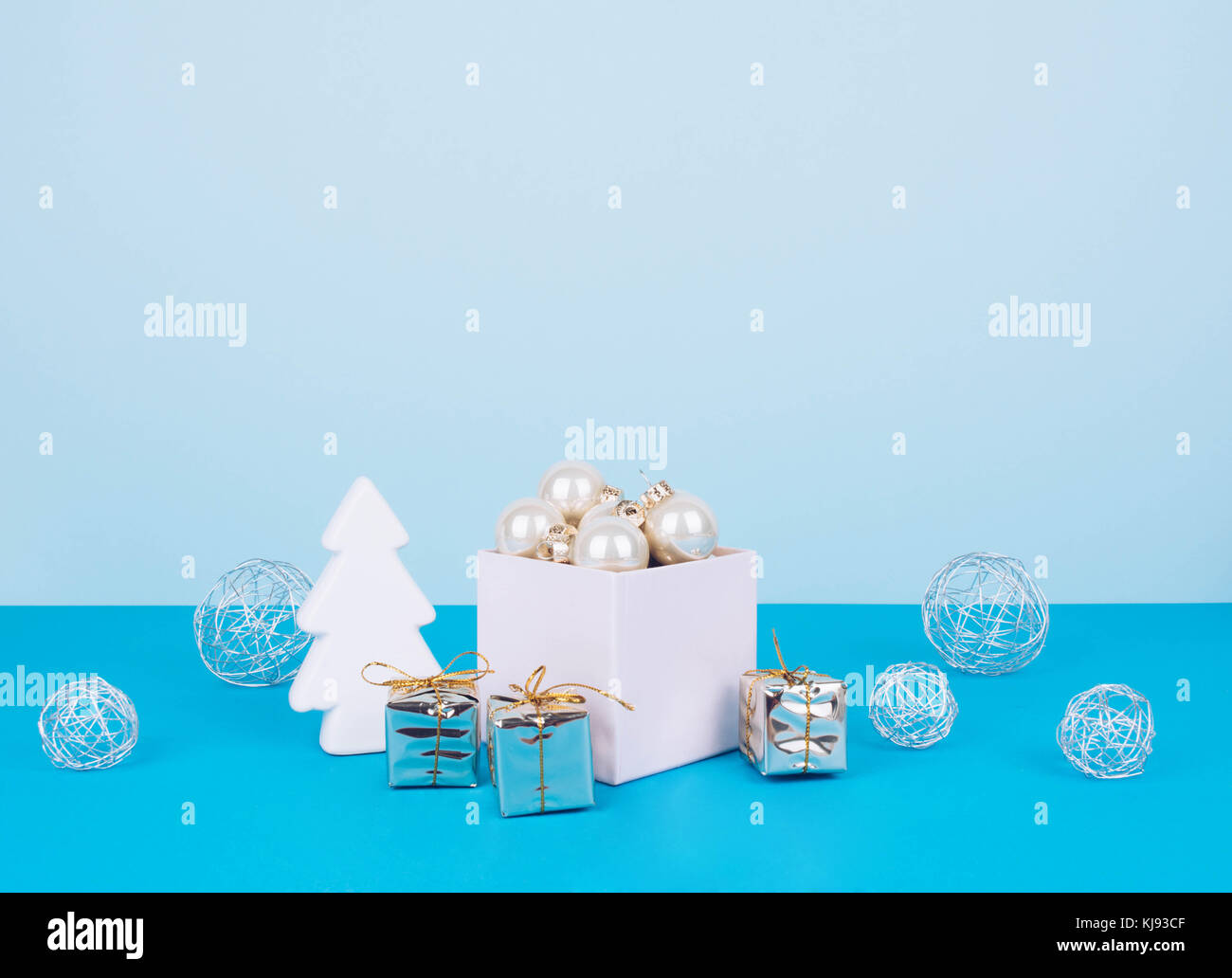 Christmas tree balls on a blue background Stock Photo - Alamy