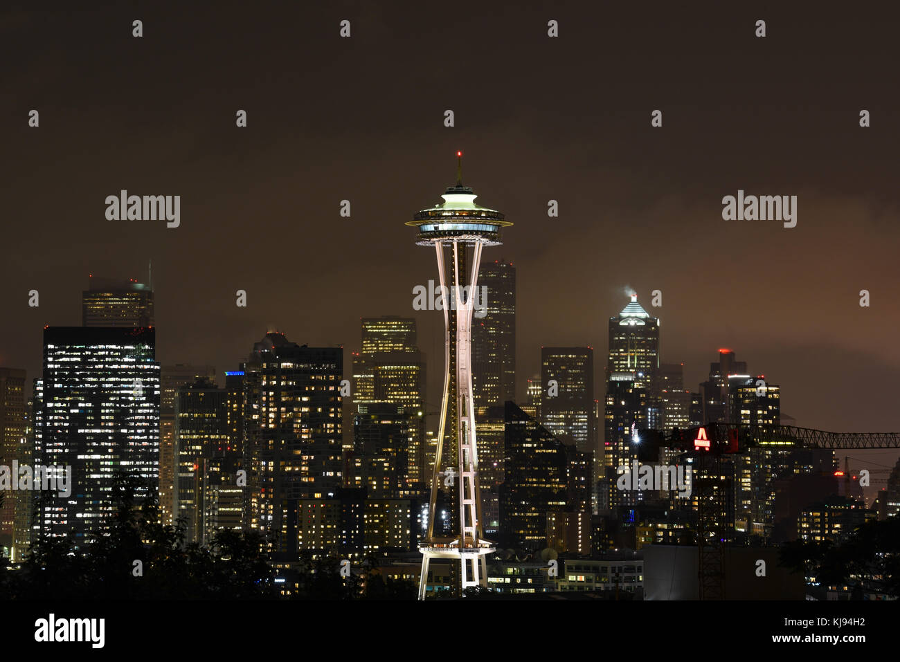 Evening dusk city scape of Seattle skyline Space Needle at night with lights Stock Photo