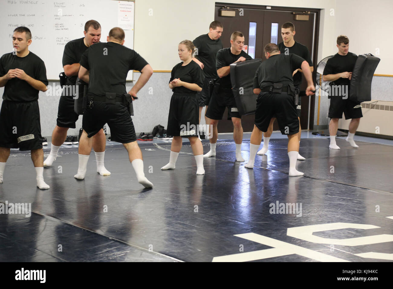 Cadets with the Wisconsin State Patrol Academy practice self-defense ...