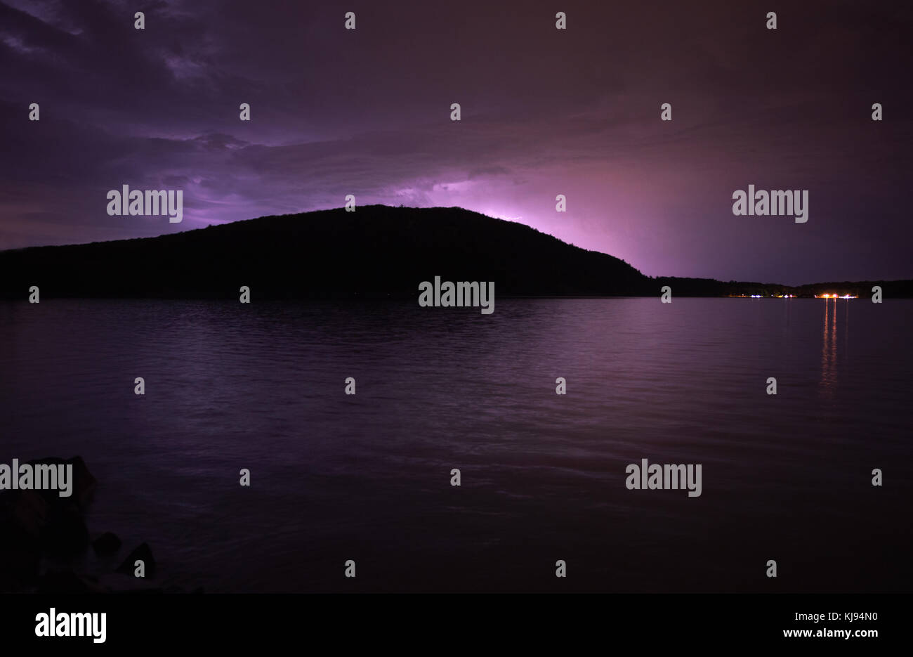 A spring thunderstorm at night over Devils Lake, Wisconsin, USA Stock Photo