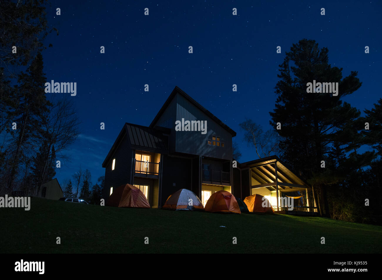Campers' tents and guesthouse, Headlands International Dark Sky Park, Mackinaw City, Michigan Stock Photo