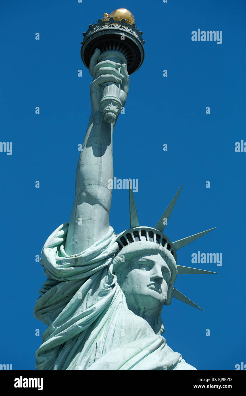 Statue of Liberty upper part, blue sky in New York Stock Photo