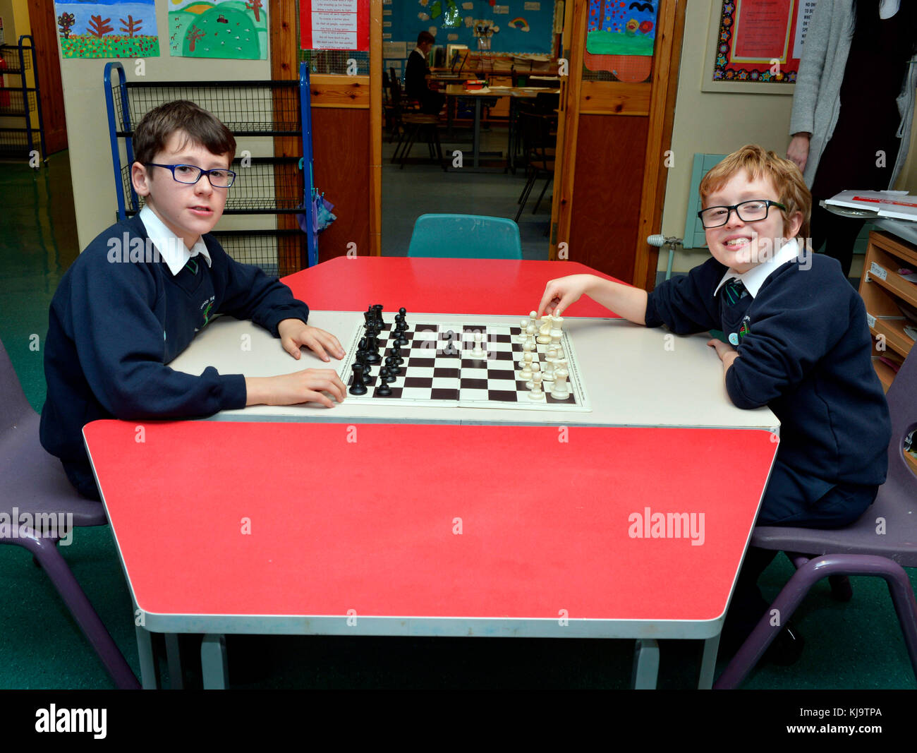 Primary school children play chess in Londonderry, Northern Ireland