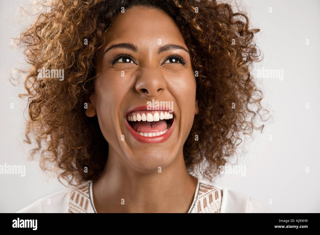 Portrait of a beautifuk African American woman laughing Stock Photo