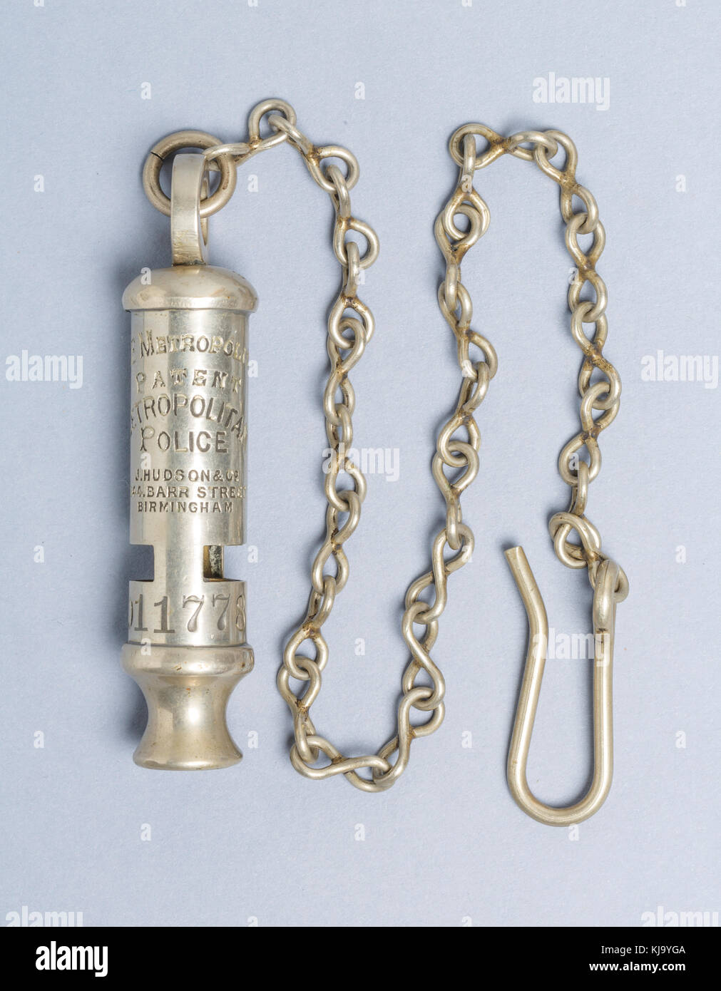 Metropolitan Police whistle.1910s, and chain. Hudson and Co. Birmingham