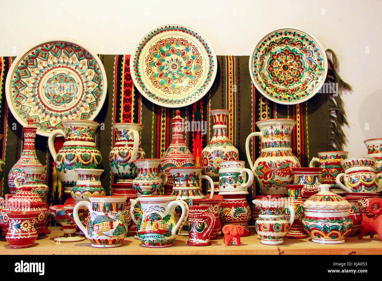 earthenware on the shelf of pottery shop Stock Photo - Alamy