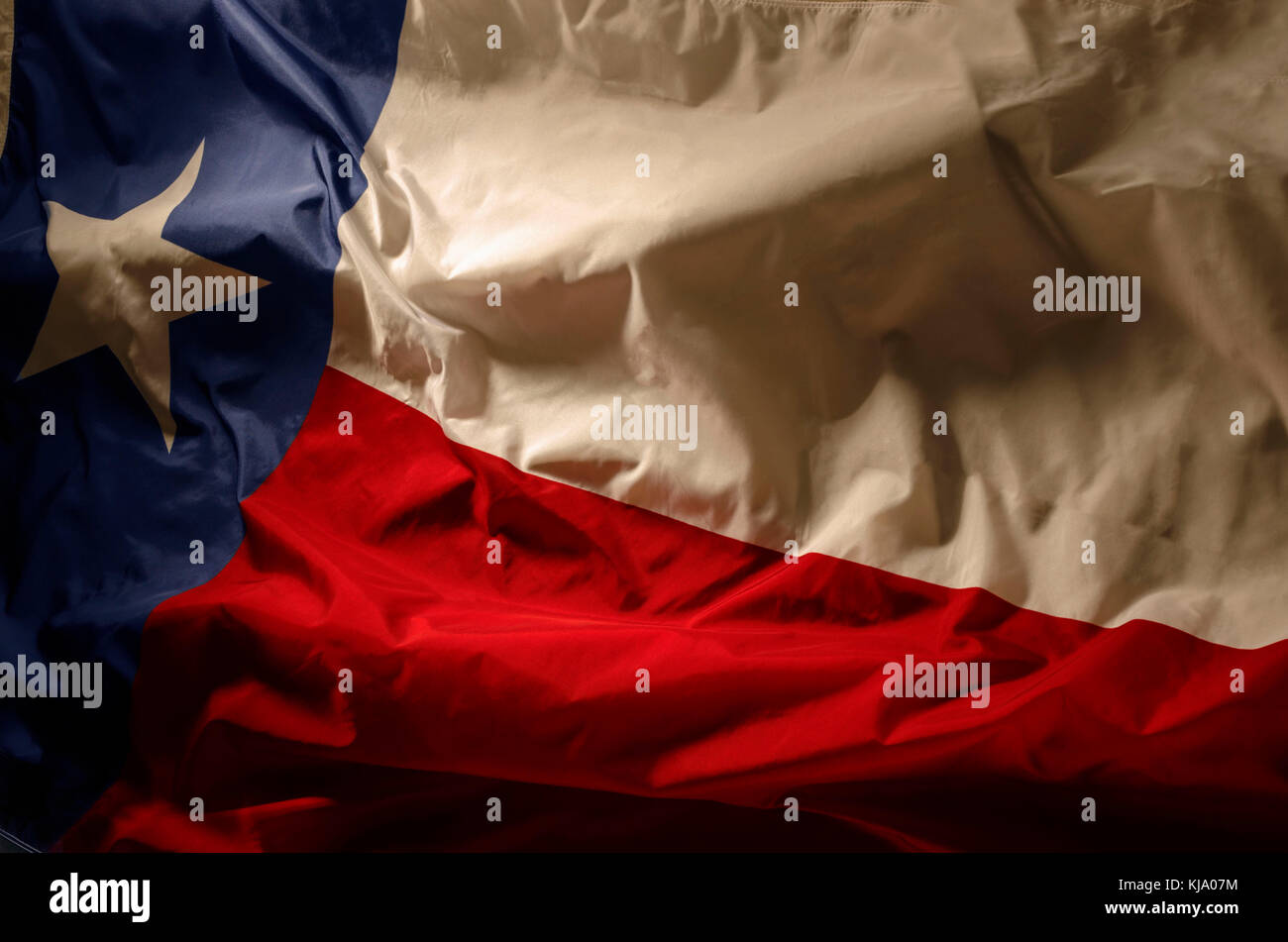The Lone star flag of Texas in shadow and light Stock Photo Alamy
