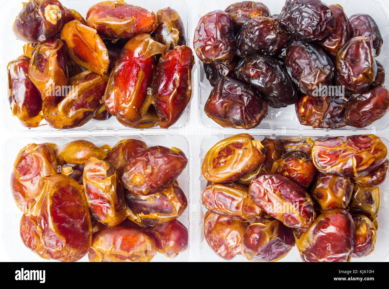 Various types of dates in a package top view Stock Photo - Alamy