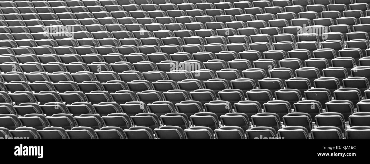 Stages of the stadium with empty seats waiting for the start of the match Stock Photo
