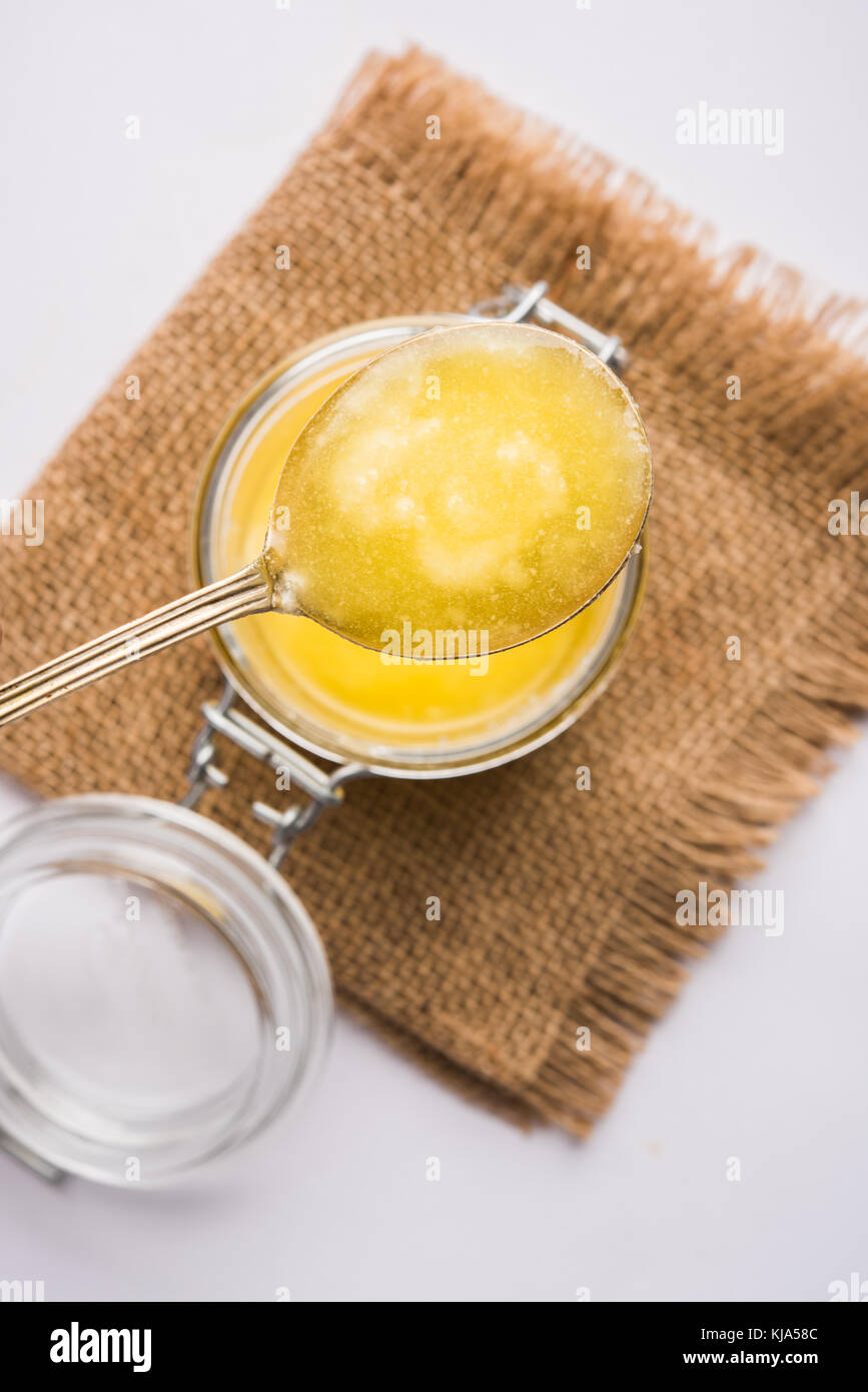 Desi Ghee or clarified butter in glass or Copper container or ceramic
