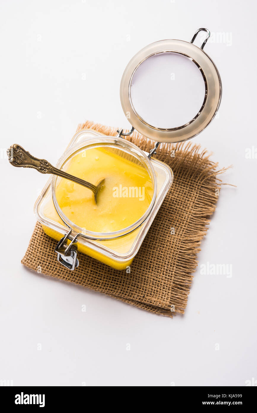 Desi Ghee or clarified butter in glass or Copper container or ceramic