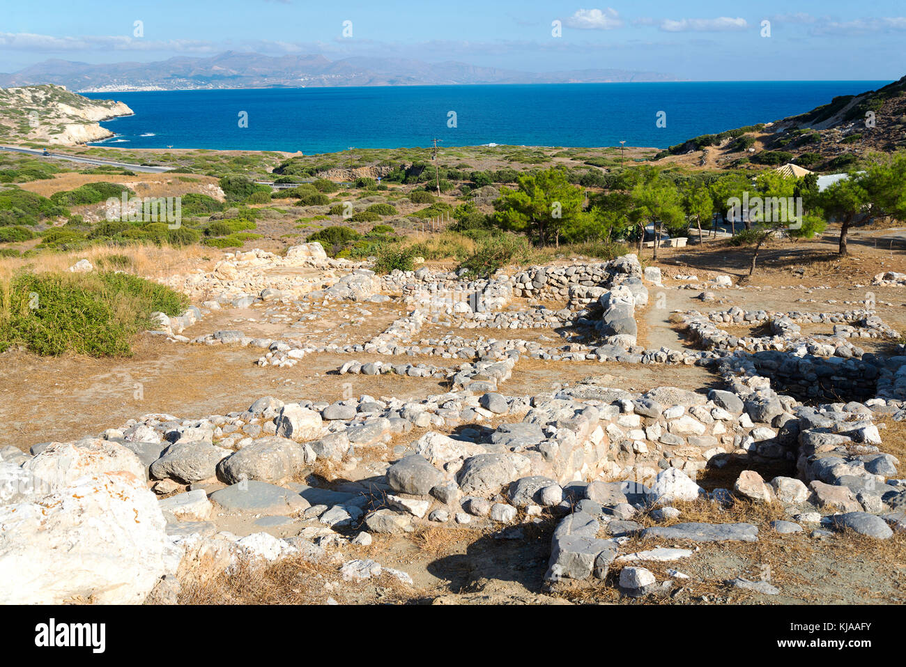 Remains of walls of buildings of the ancient people on the island of Crete. Stock Photo