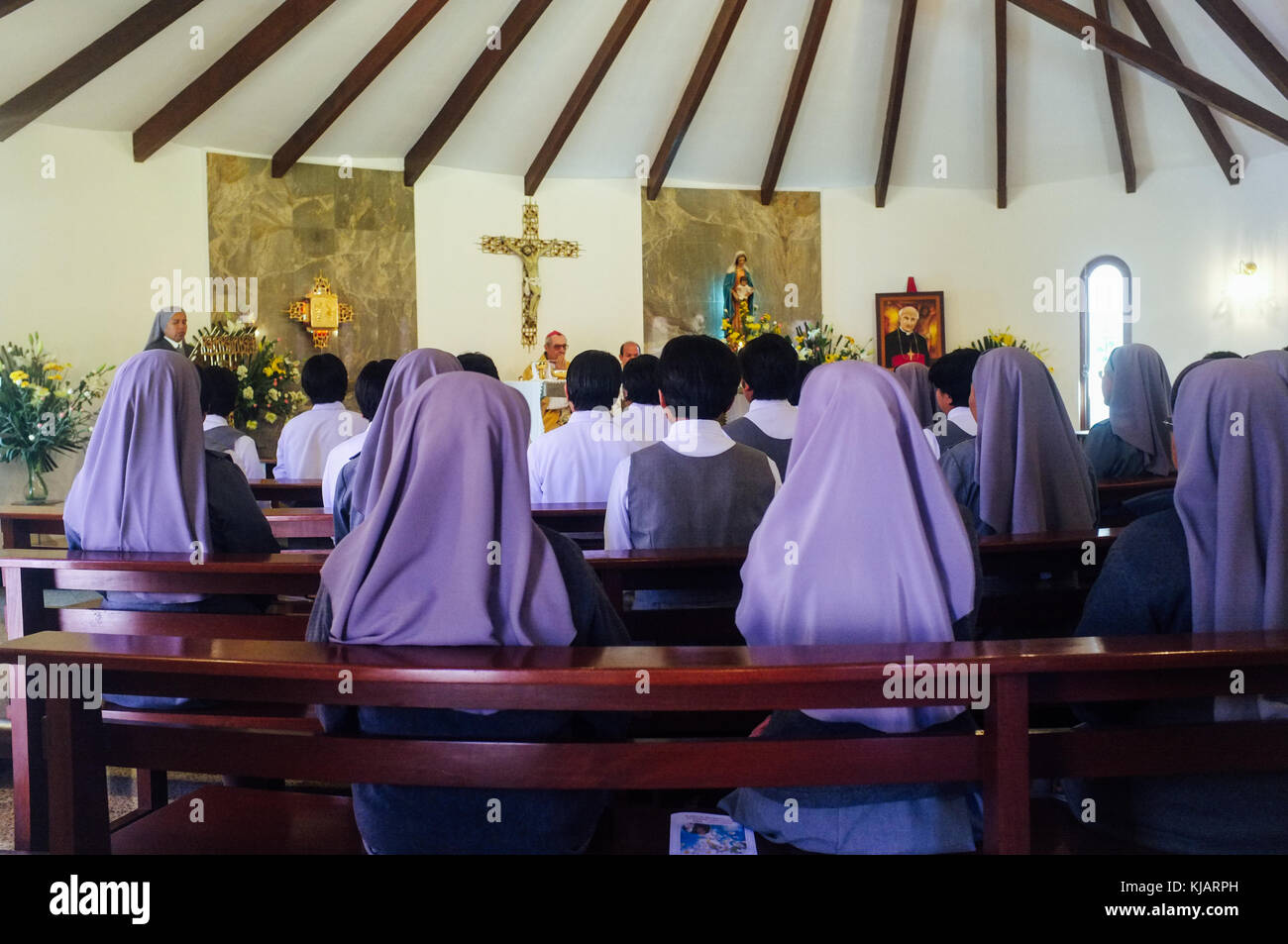 Nuns praying at a religious service in the morning. Oblate nuns order Mission responsible for international latin adoptions. Cochabamba, Bolivia. Stock Photo