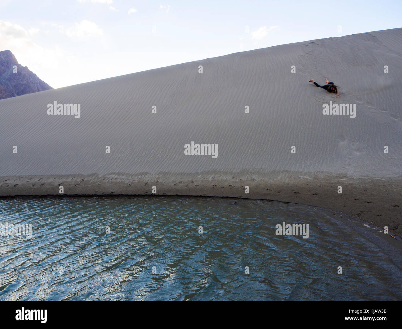 children having fun at the sand dunes - Nubra valley Ladakh India Stock ...