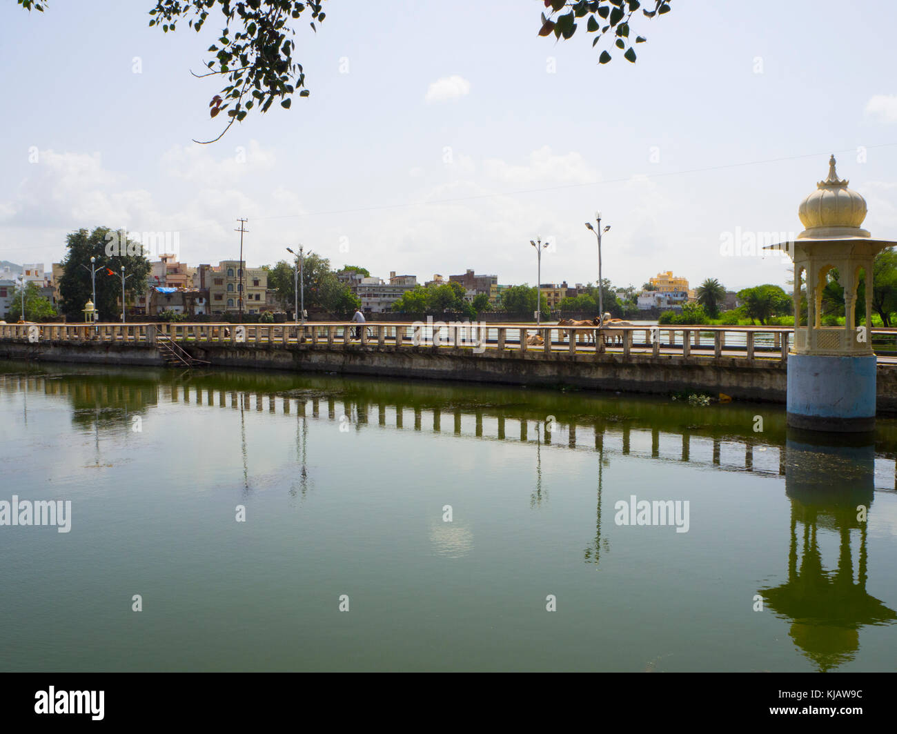 bridge reflection at the lake - old Udaipur Rajastan India Stock Photo