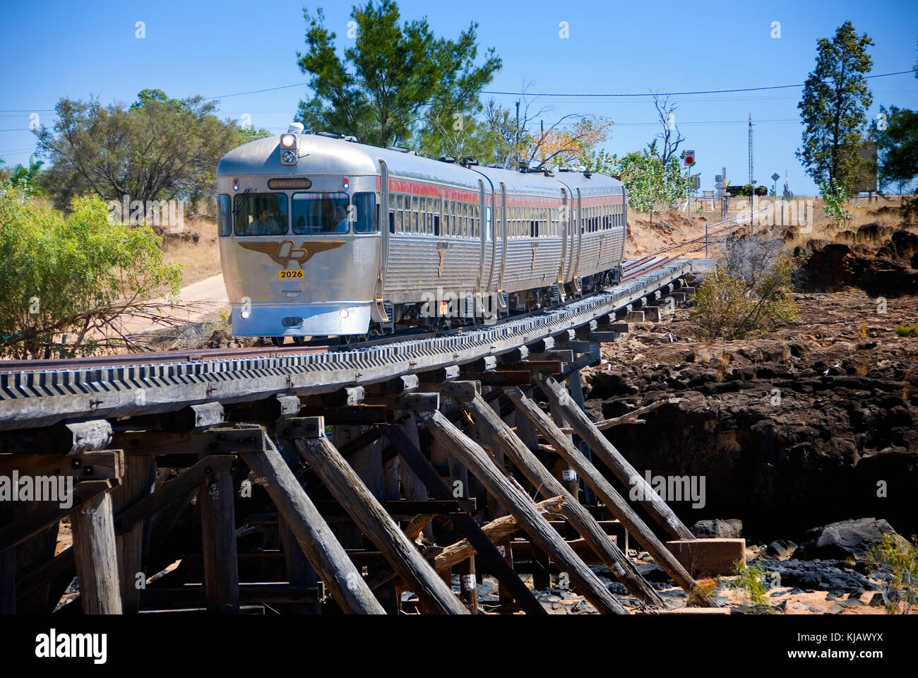The Savannahlander tourist train crossing the Copperfield River at Einasleigh in the Queensland Gulf country Stock Photo