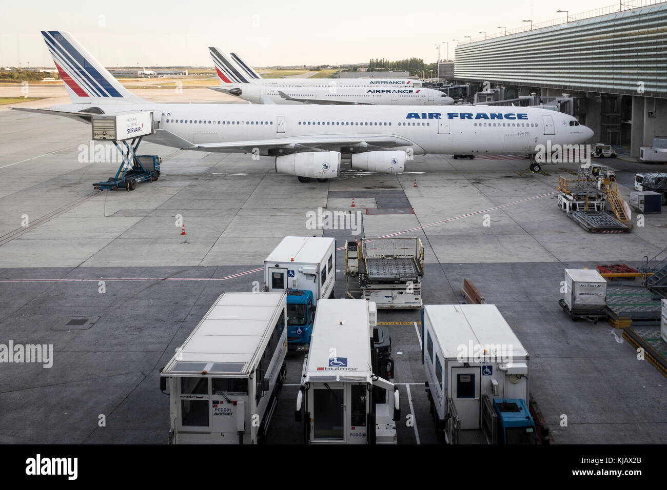 Airbus aircraft stand at their gates at Paris Charles de Gaulle, aka Roissy, Airport in France. Stock Photo