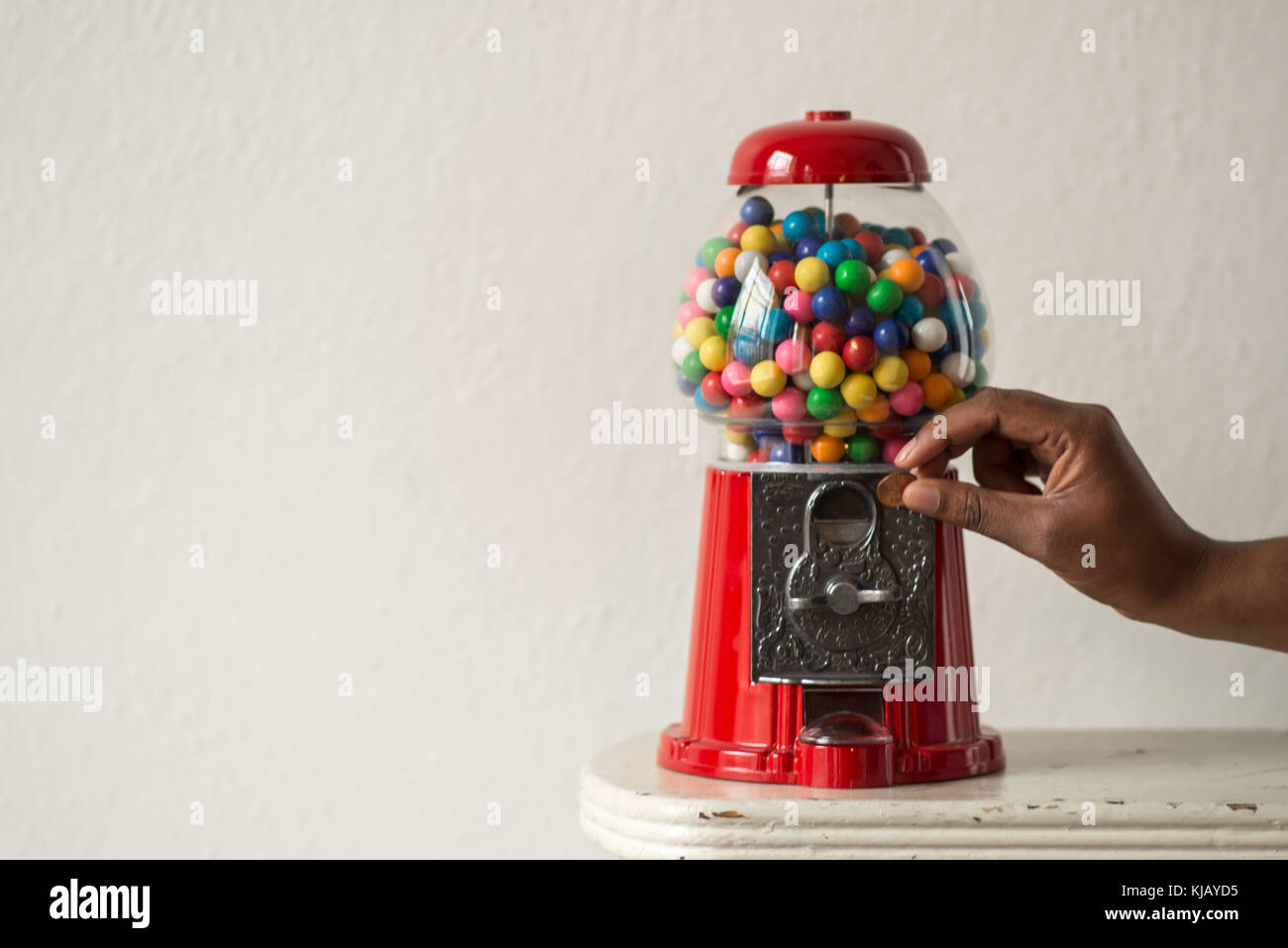 Vintage Red Chewing Gum-ball Machine Stock Photo
