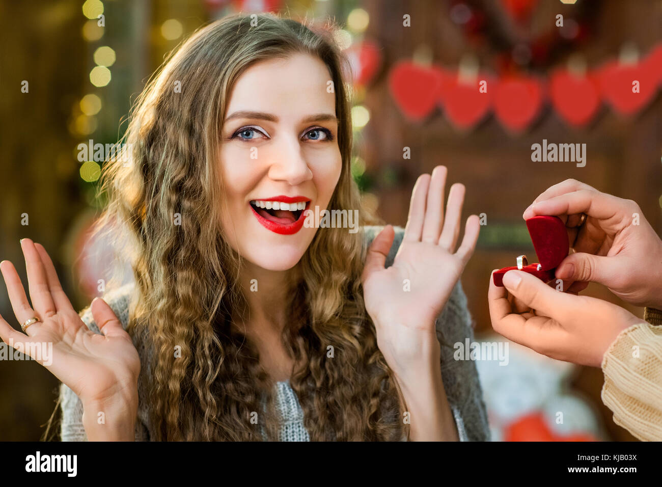 boy present his girl ring at valentine's day Stock Photo