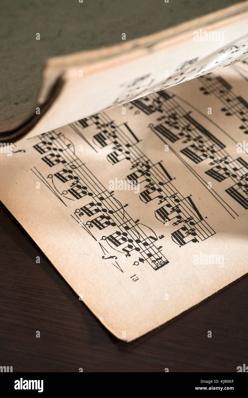 Music notation book. Page with music notes. Vinatge pages Stock Photo