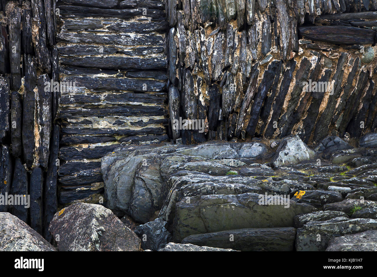Old sea wall rough stone work Stock Photo