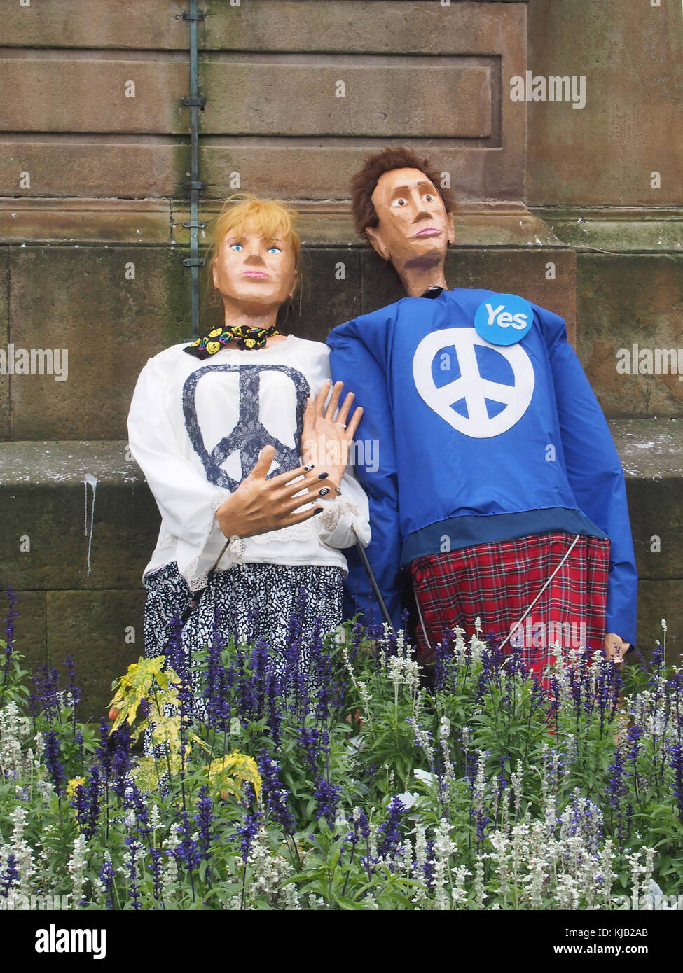 GLASGOW, SCOTLAND- SEPTEMBER 19 2015:  Two Anti-nuclear paper mache figures at the one-year anniversary of the Scottish Independence Referendum vote. Stock Photo