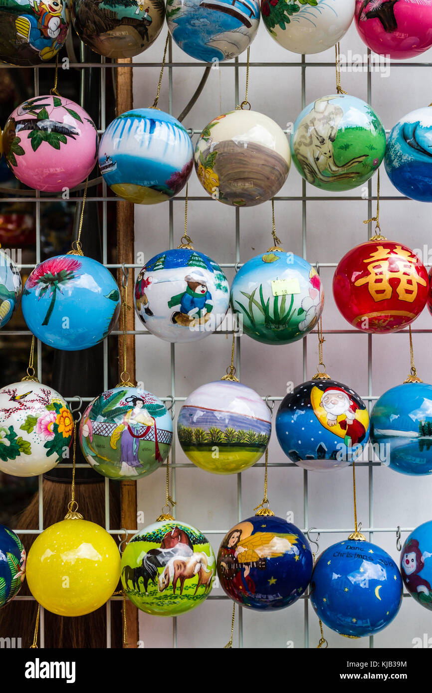Hanging christmas tree decorations (baubles) on sale in Chinatown, Singapore Stock Photo