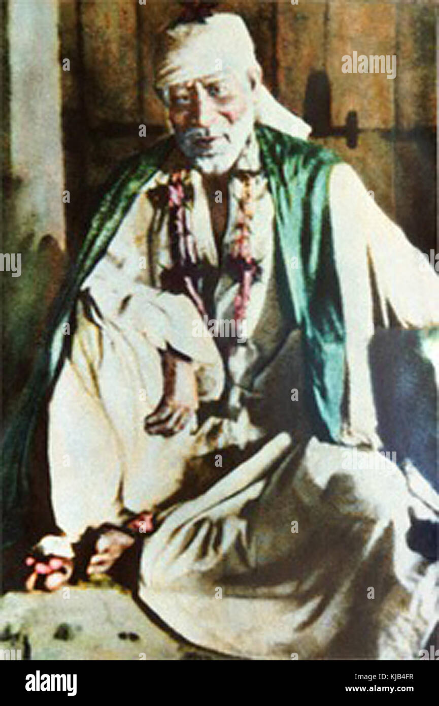 Sai Baba of Shirdi with garland Stock Photo - Alamy