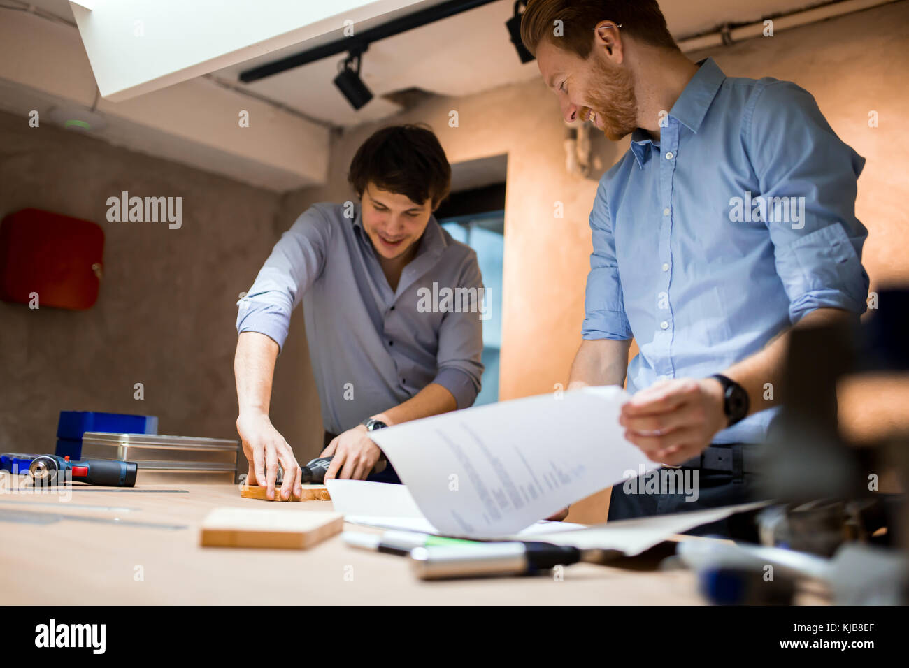 Two designers working together Stock Photo - Alamy
